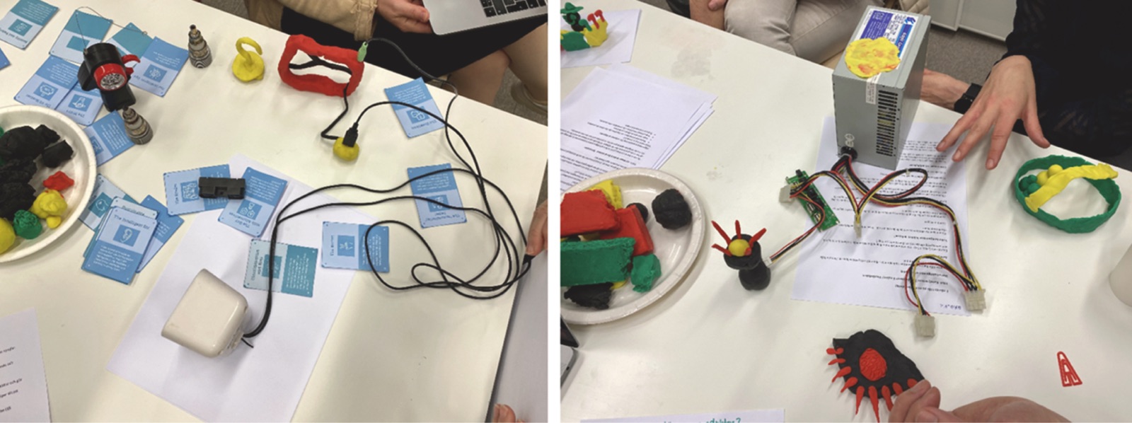 Two photos of tables with clay shapes in red, yellow and black, cables, old electronic parts, a power supply and blue cards, with the hands of participants