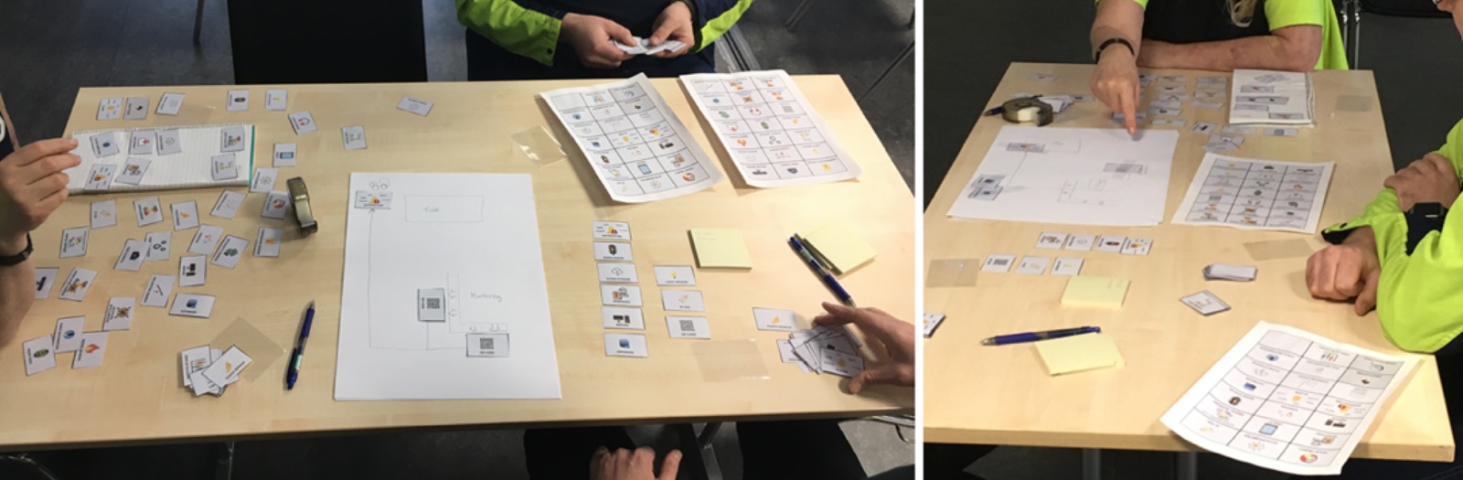 Two views of a table covered with small paper stickers, sticker sheets, an A3 paper with a sketch, pens and sticky notes, with the hands of workers around it
